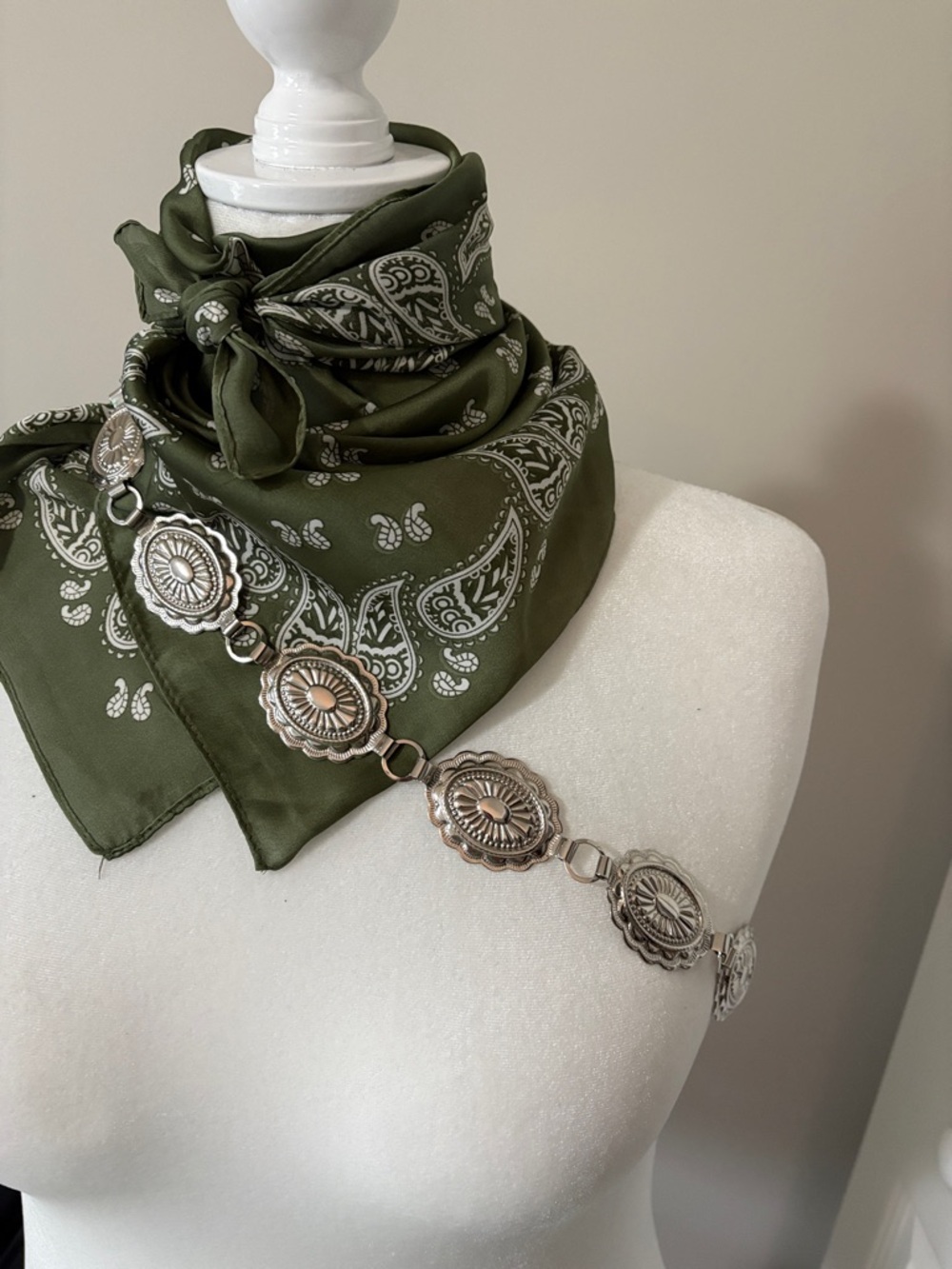 Western style silver conch belt.